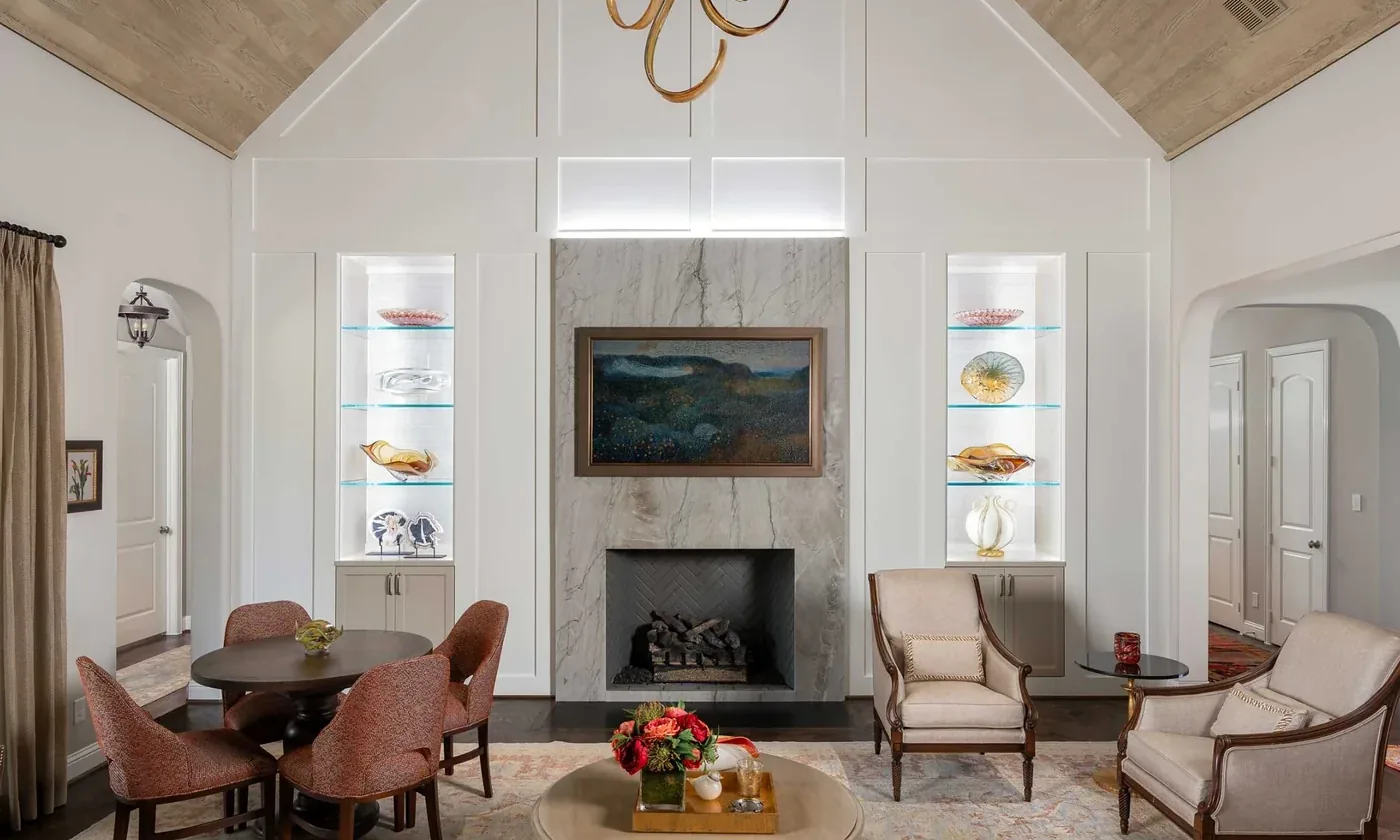 Living room of the NARI Remodeler of the Year 2025 project with tunable lighting and lit shelves