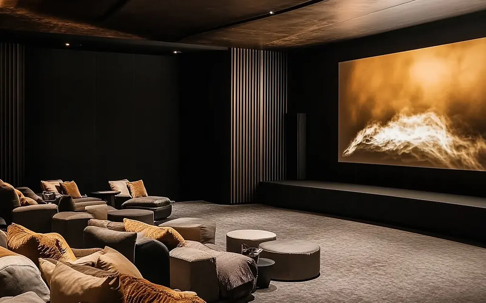 Dark home theater with acoustic wood-slat walls, lounge seating and a warm film image on the screen