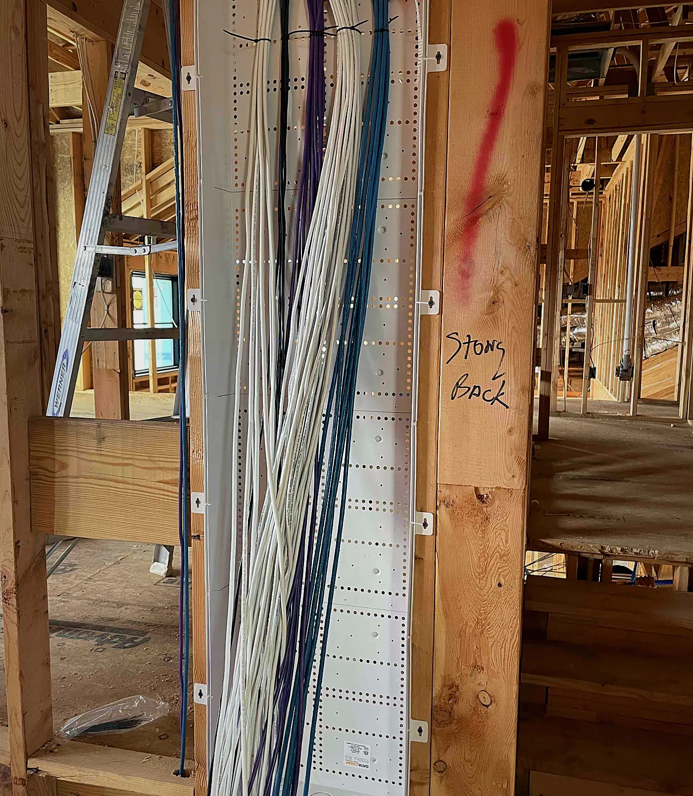Structured low-voltage pre-wire panel on a WH Technologies new-construction project