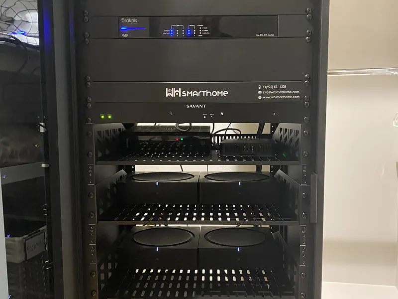 Equipment rack with Savant components and tidy cabling