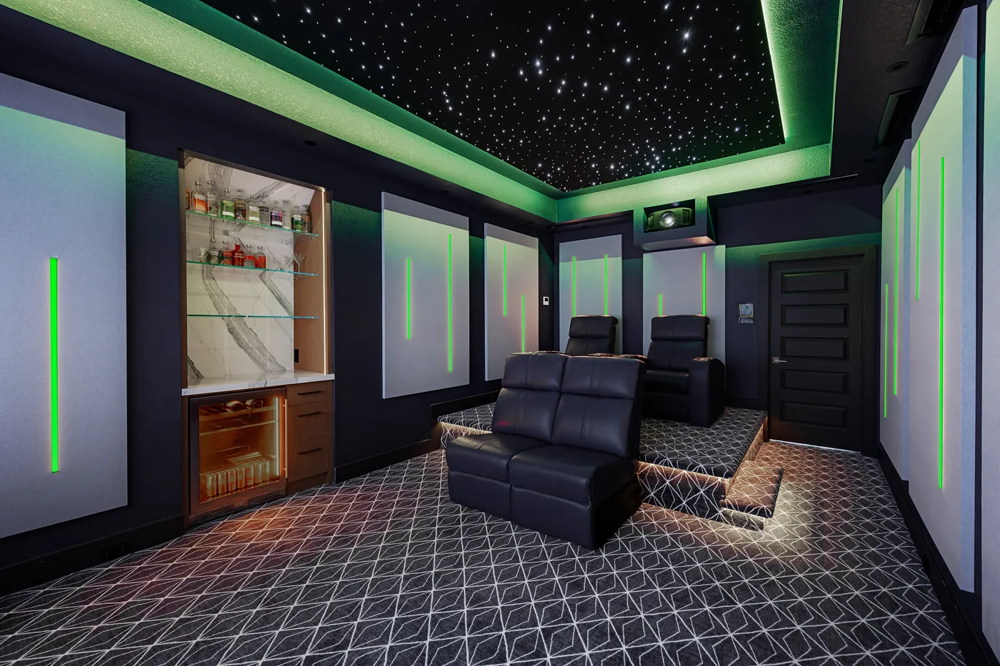 The same theater in a green lighting scene with the star ceiling on