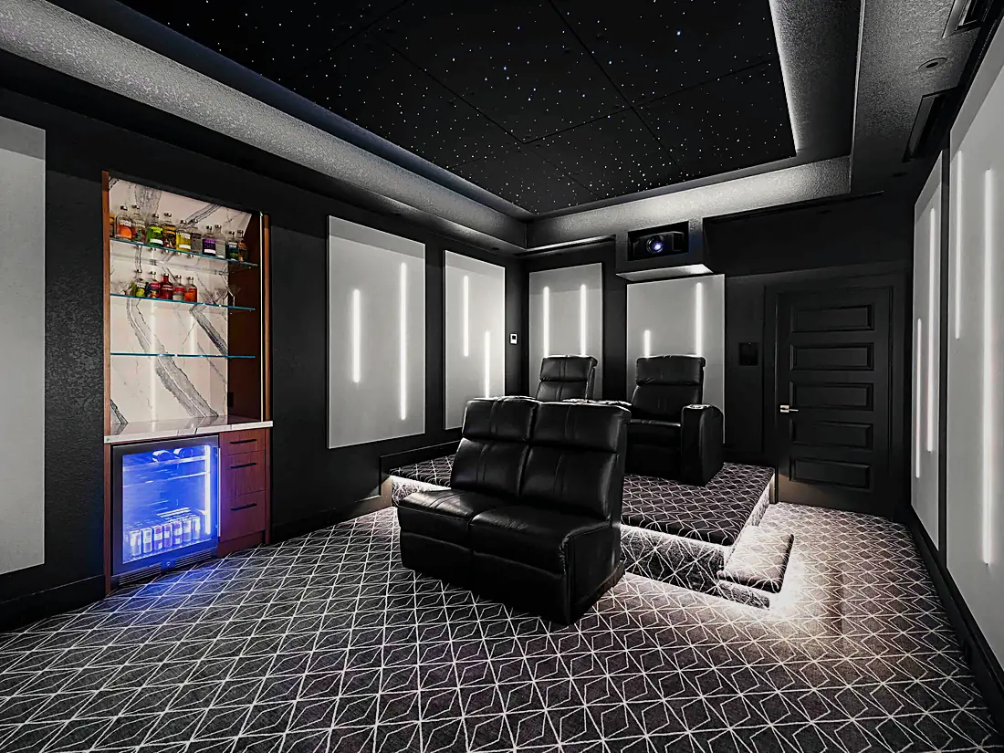 Dedicated home theater with a fiber-optic star ceiling, LED-lit acoustic wall panels, black reclining seats on a tiered platform and a backlit bar with a beverage fridge